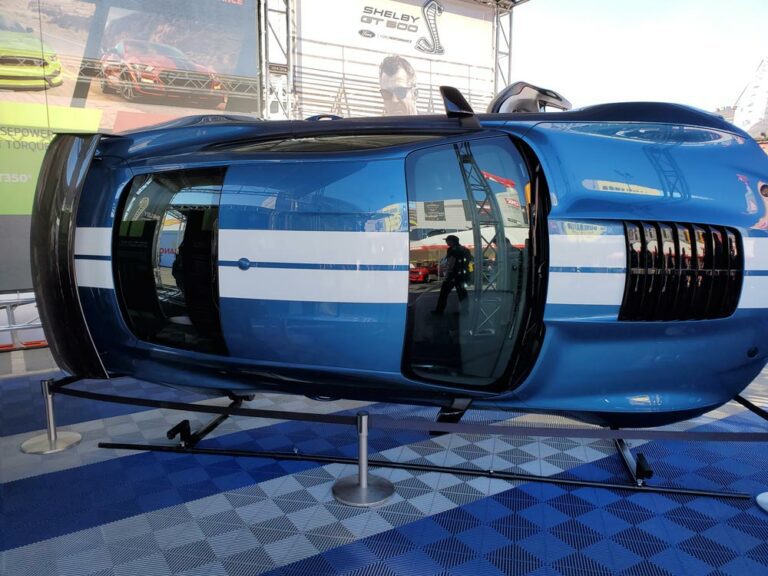 Blue Car With a Blue Stripe on the Side View